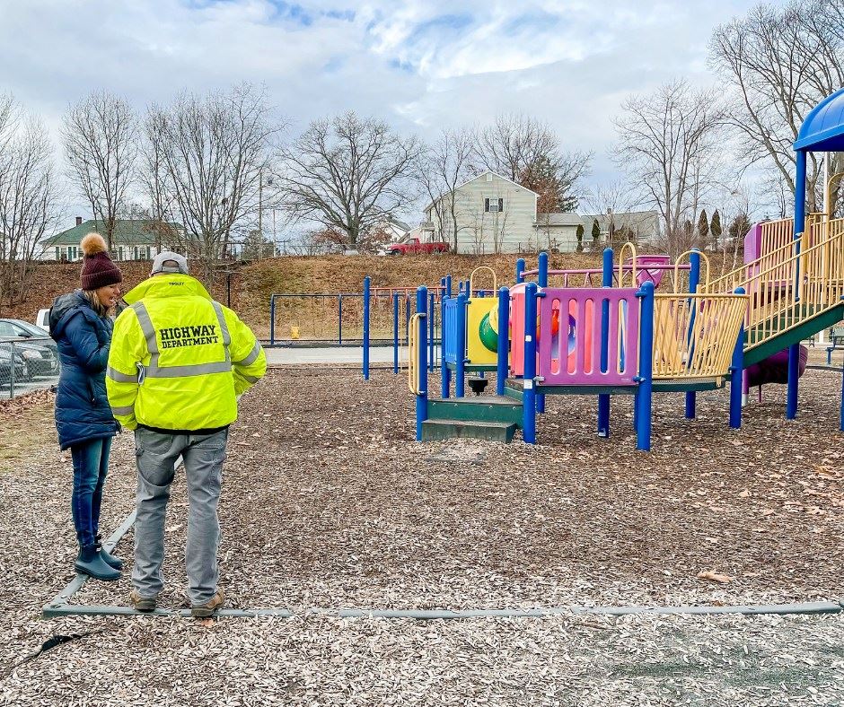 Two people looking at the BF Norton Playground